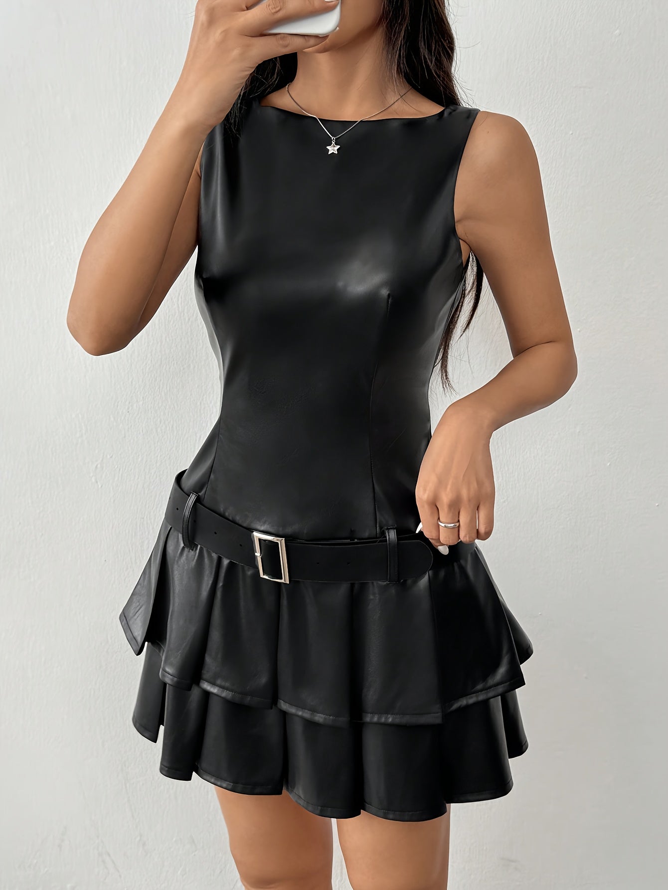 Elegant Sleeveless Black PU Leather Pleated Dress with Ruffled Hem and Belt Detail
