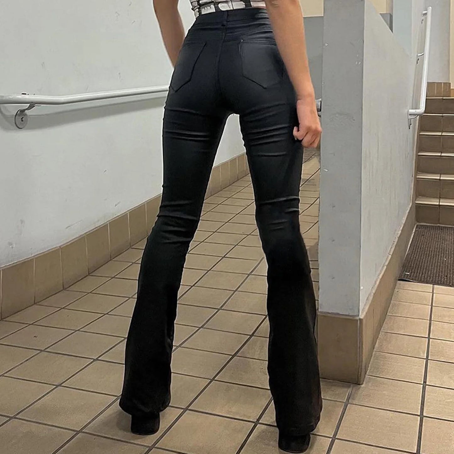 Flared PU Leather Casual Trousers in Black, featuring a stylish fit for everyday wear