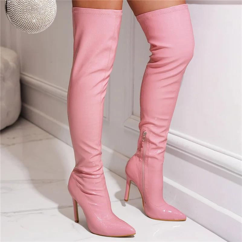 Stylish pink glossy over the knee boots with a sleek design and high stiletto heels