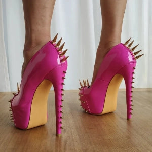 Pink high heel shoes with gold riveted platform pumps and spike details on the back
