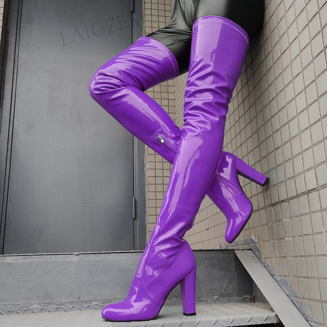 Shiny thigh high boots in vibrant purple with high heels for stylish footwear