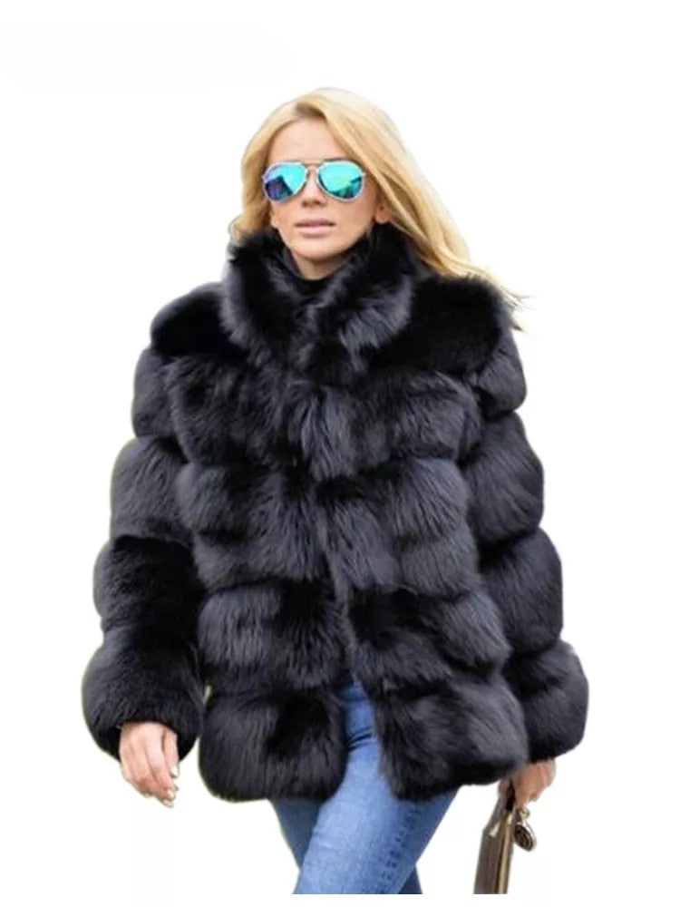 Stylish woman wearing a luxury faux fur coat with a chic design and sunglasses for a glamorous look
