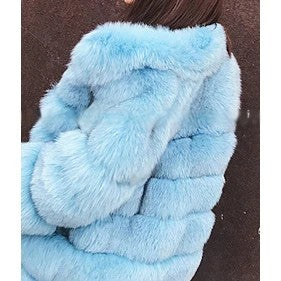 Luxury faux fur coat in soft blue with a plush texture for stylish cold weather wear