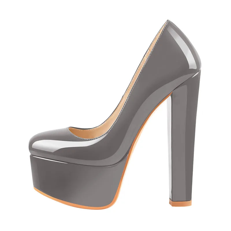Stylish gray pumps featuring a high platform and chunky heel, perfect for dressing up any outfit