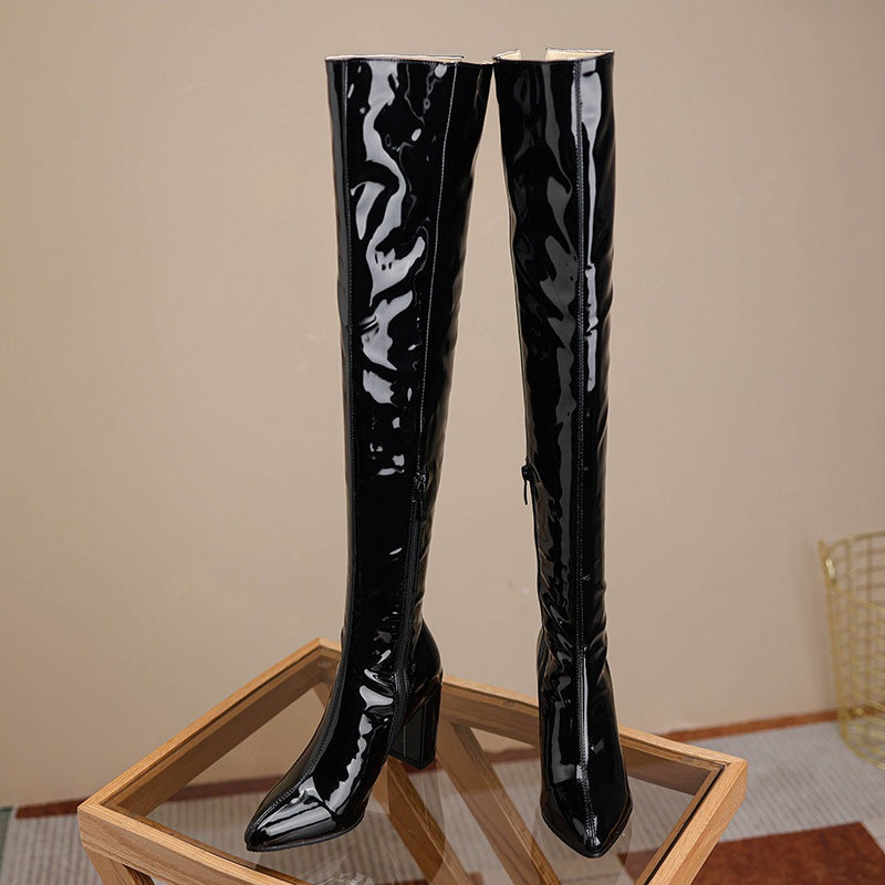 Sleek over the knee leather boots with a glossy finish and stylish block heels