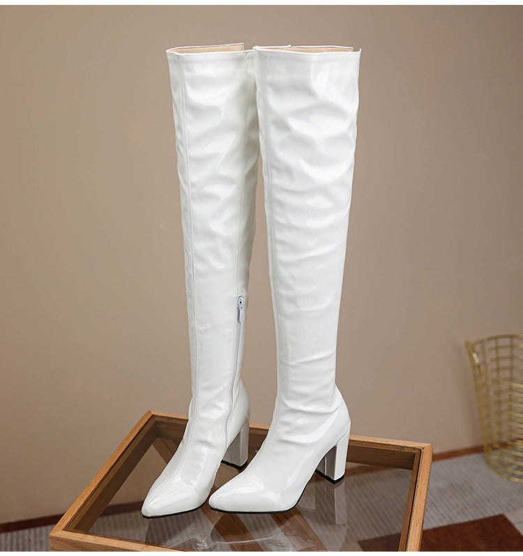 Stylish white over the knee leather boots with block heels for a fashionable look