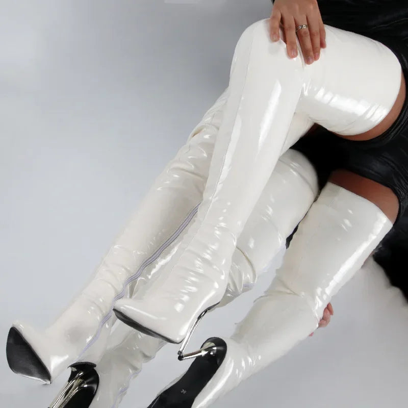 Sleek patent leather thigh high boots in white with stylish stiletto heels for a bold fashion statement