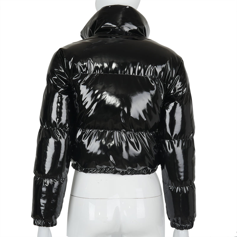 Back view of a cropped shiny puffer coat in black with a glossy finish and elastic cuffs