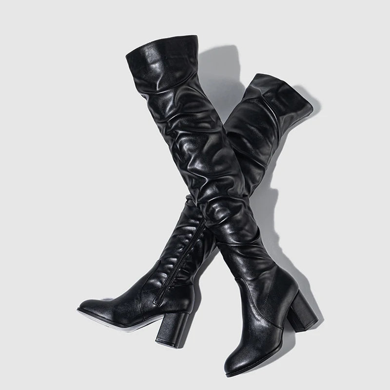 Stylish soft pleated leather knee boots with a chunky heel for a trendy look