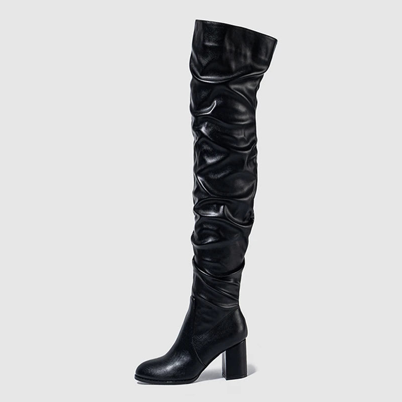 Soft pleated leather knee boots in black with a stylish slouch design and high heels