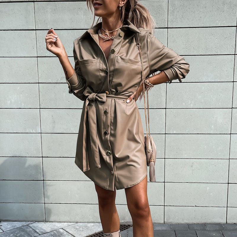 Eedele long sleeve button down dress in beige, featuring a belted waist and stylish collar