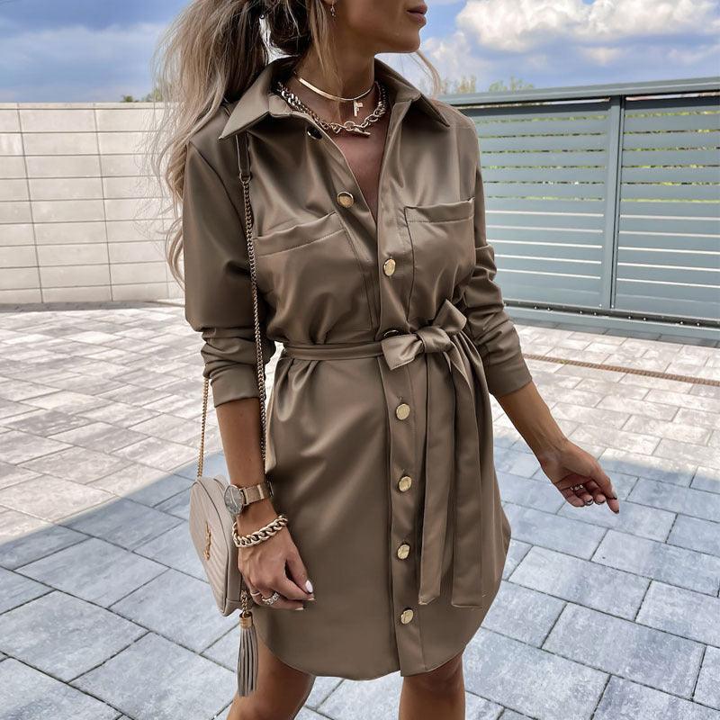 Eedele long sleeve button down dress in beige with a tie waist and pockets for a stylish look