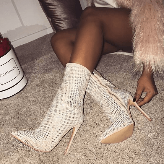 Stylish rhinestone ankle boots with a pointed toe and side zipper for a fashionable look
