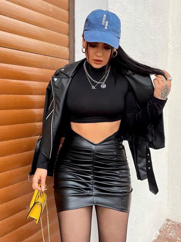 Stylish vegan leather ruched skirt paired with a black crop top and leather jacket for a chic look