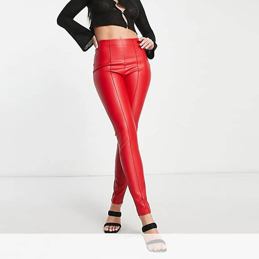 Stylish red elastic mid waist faux leather pants with a sleek design and form-fitting silhouette