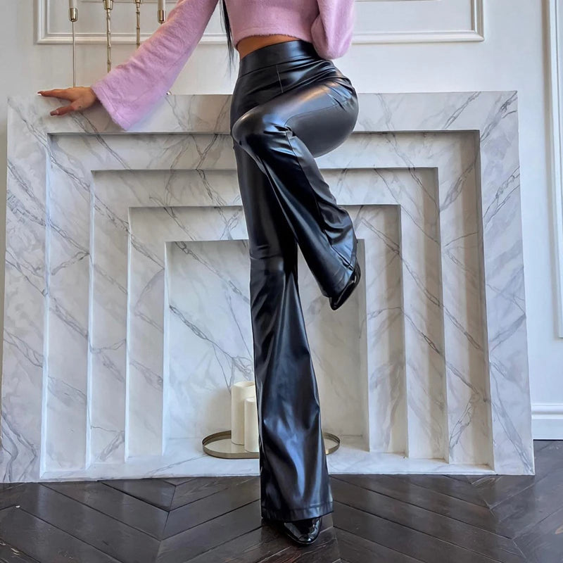 Flared High Waist PU Leather Trousers styled with a pink sweater for a chic look