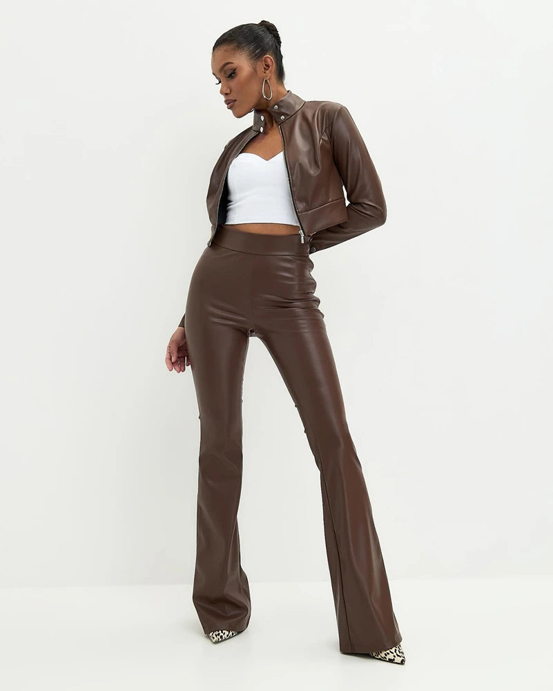 Stylish model wearing Flared High Waist PU Leather Trousers with a matching brown jacket and white top