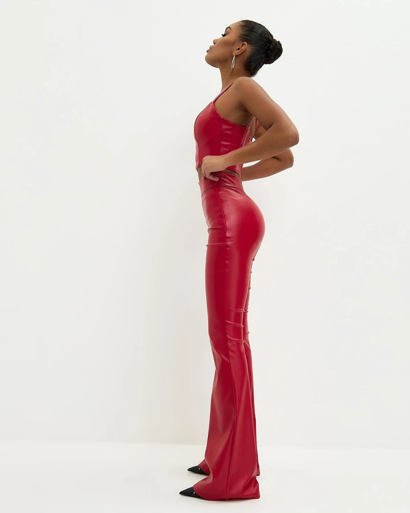 Model wearing Flared High Waist PU Leather Trousers in red, showcasing a sleek and stylish fit