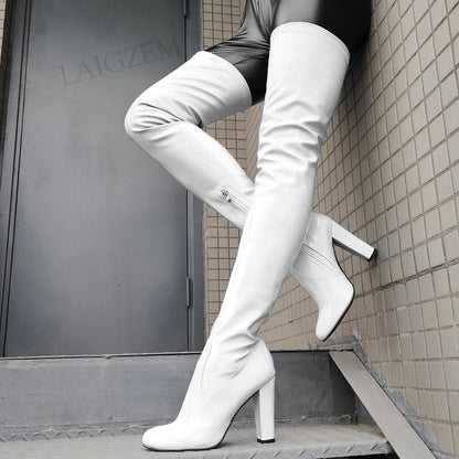 Stylish shiny thigh high boots in white with high heels for a bold fashion statement