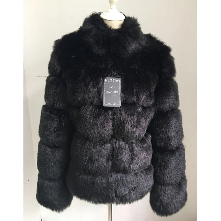 Black luxury faux fur coat with a fluffy texture, perfect for stylish winter wear