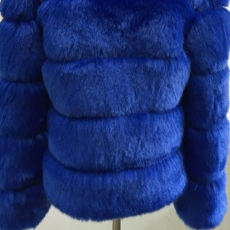 Vibrant blue luxury faux fur coat with plush texture and stylish design for winter fashion
