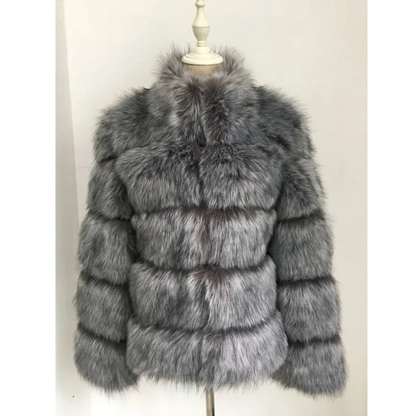 Stylish luxury faux fur coat in gray with plush texture and puffy design for chic winter fashion