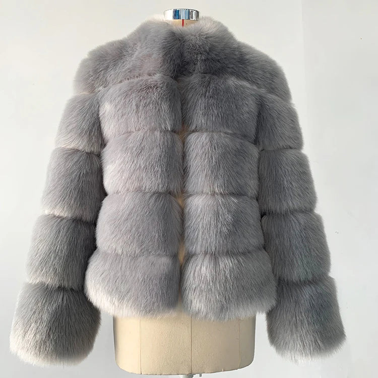 Luxury faux fur coat in gray featuring a plush, stylish design for elegant winter wear