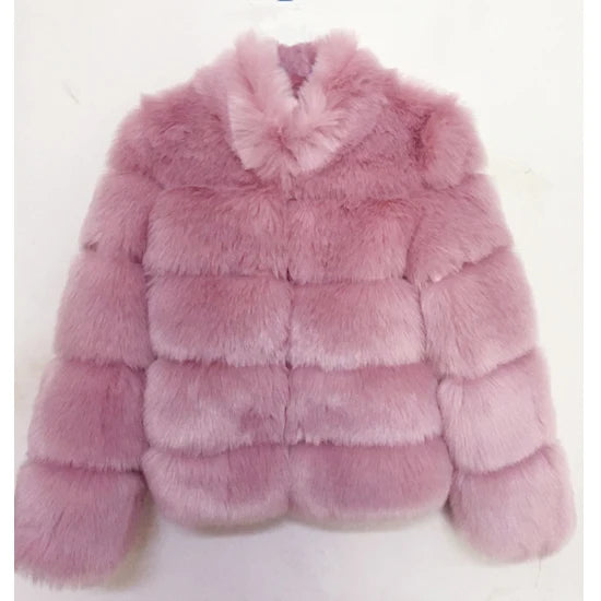 Luxury faux fur coat in soft pink with a cozy and stylish design for winter wear