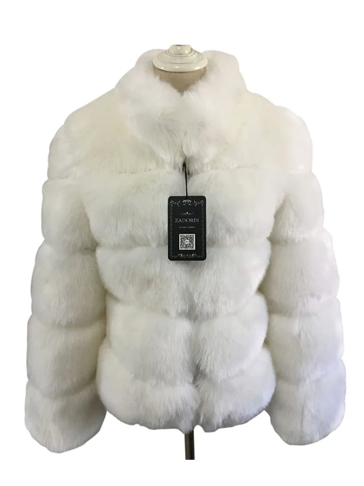 Luxury faux fur coat in white with a stylish quilted design for elegant winter wear