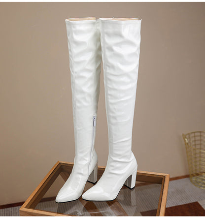 Stylish white over the knee leather boots with block heels for a fashionable look
