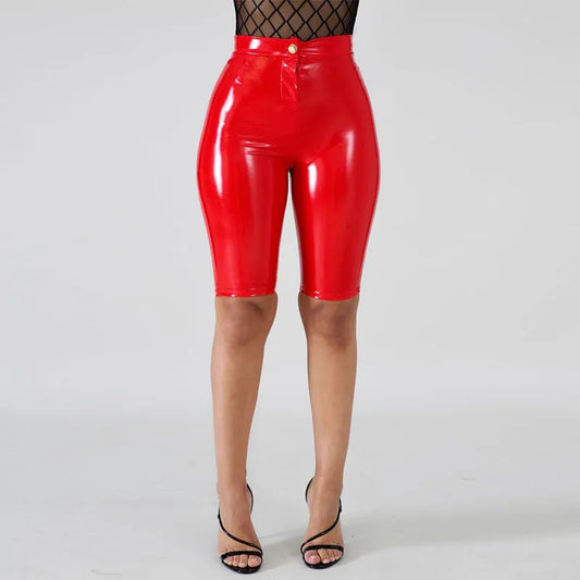 Red patent leather bicycle shorts with a high waist and button detail for a fashionable look