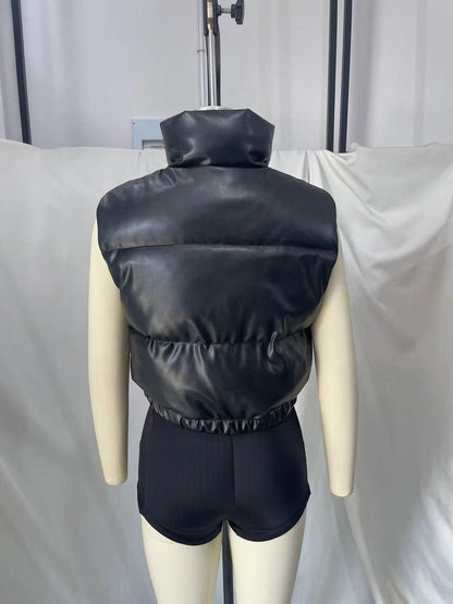 Back view of a TRAF faux leather body warmer with a cinched waist designed for trendy layering