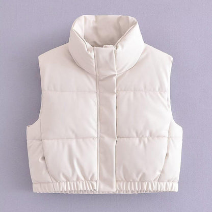 Cream TRAF faux leather body warmer with a high collar and quilted design for stylish layering