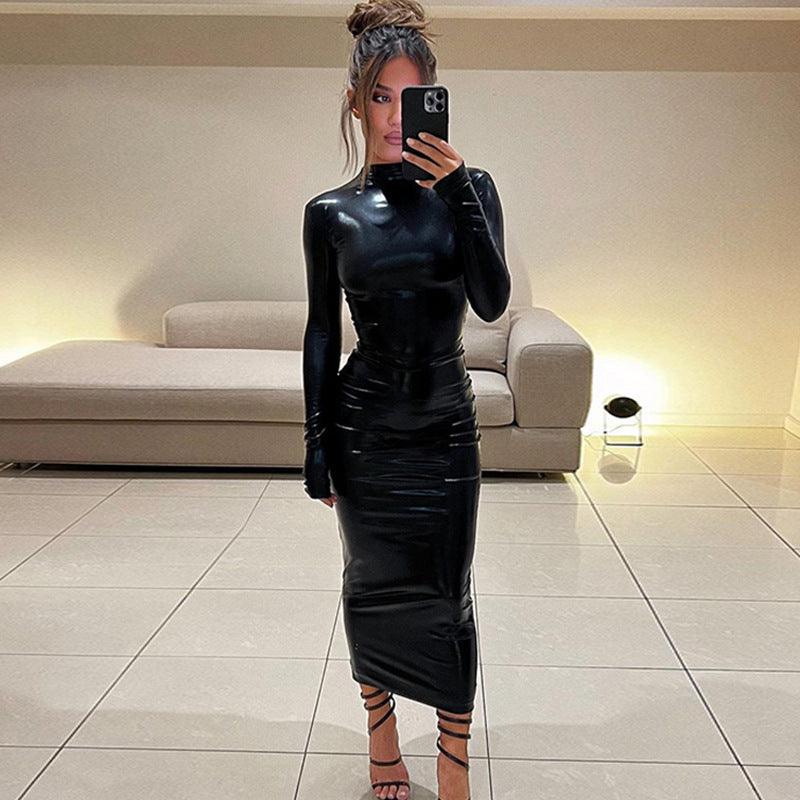 Elegant SAFENA faux leather evening dress in black, designed for sophisticated night outings