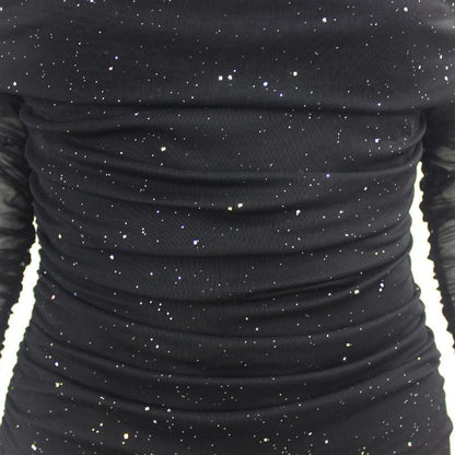 Black off-shoulder evening dress with a ruched design and starry pattern