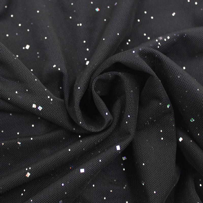 Black fabric with shimmering sequins, perfect for an off-shoulder evening dress design